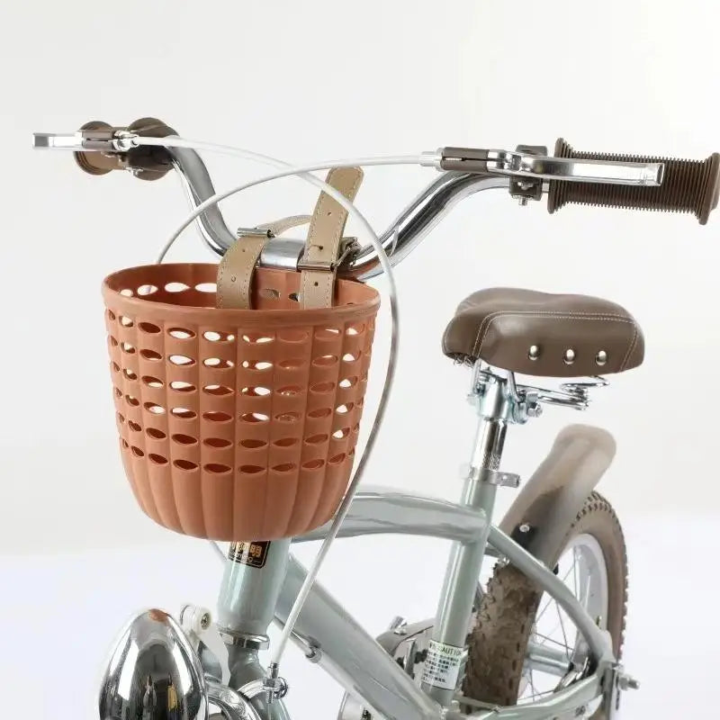 panier vélo enfant orange rose blanc perforé moderne ceinture cuir fixé clip