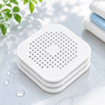 filtre bain réutilisable perforations géométriques adhésif blanc gris moderne respectueux environnement