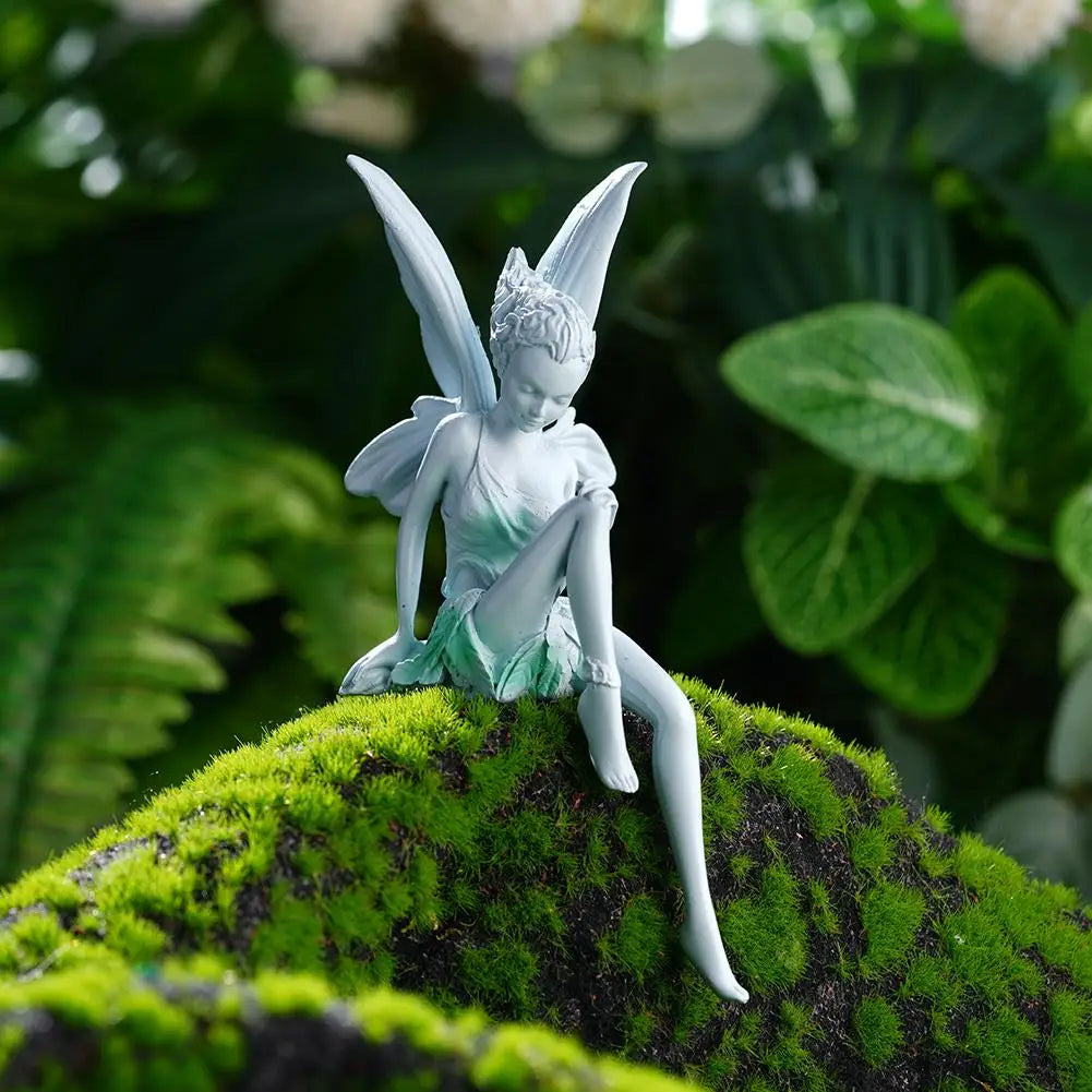 statuette féerique résine blanc vert clair ailes translucides robe tissu fin classique romantique décoration