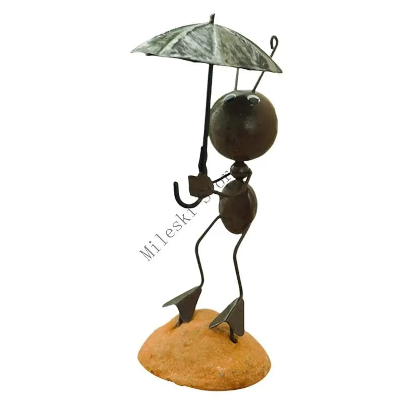 figurine métallique jardin feuilles fleurs décor extérieur moderne artisanal noir bleu vert orange blanc