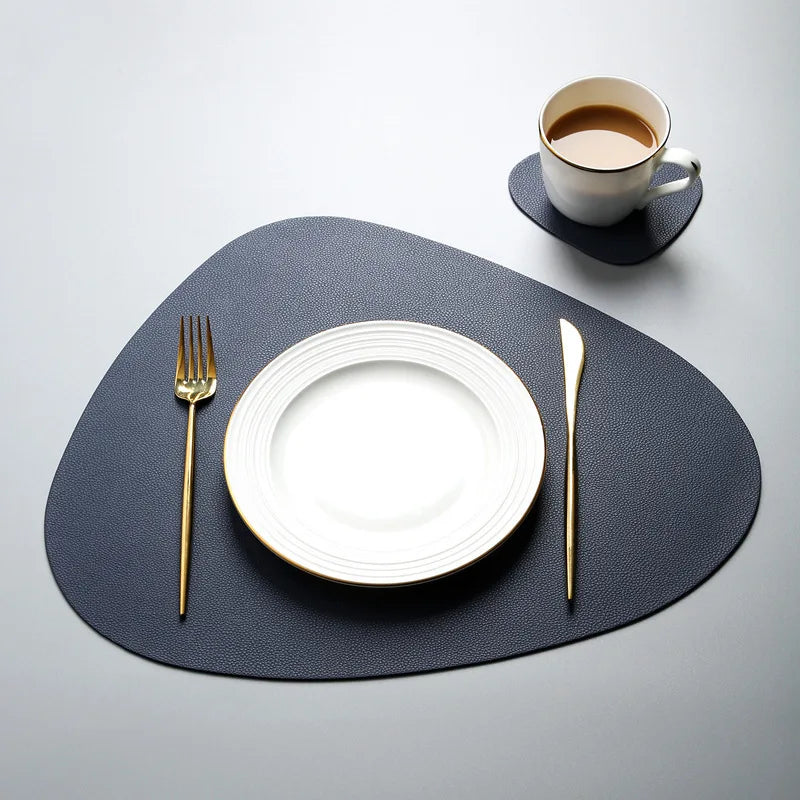 tapis table moderne gris bleu rose assiettes fourchettes cuillères tasses citrons texture cuir respectueux
