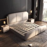 lit double moderne minimaliste beige clair cuir tissu tête rembourrée table chevet meubles chambre
