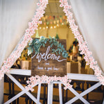 guirlande florale mariage extérieur fleurs roses blanches arches décorations festives anniversaire fêtes prénuptielles