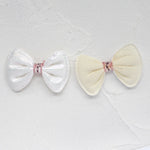 rubans forme noeud rayés pailletés blanc rose clips pinces décoration enfantine opaques nylon pack