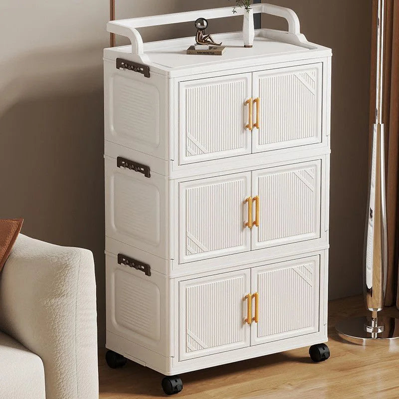 meuble rangement pliable blanc roulettes portes poignées dorées vêtements