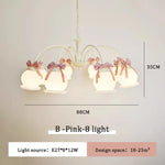 chandelier suspension vert pâle rubans roses abat jour translucides chambre enfant romantique