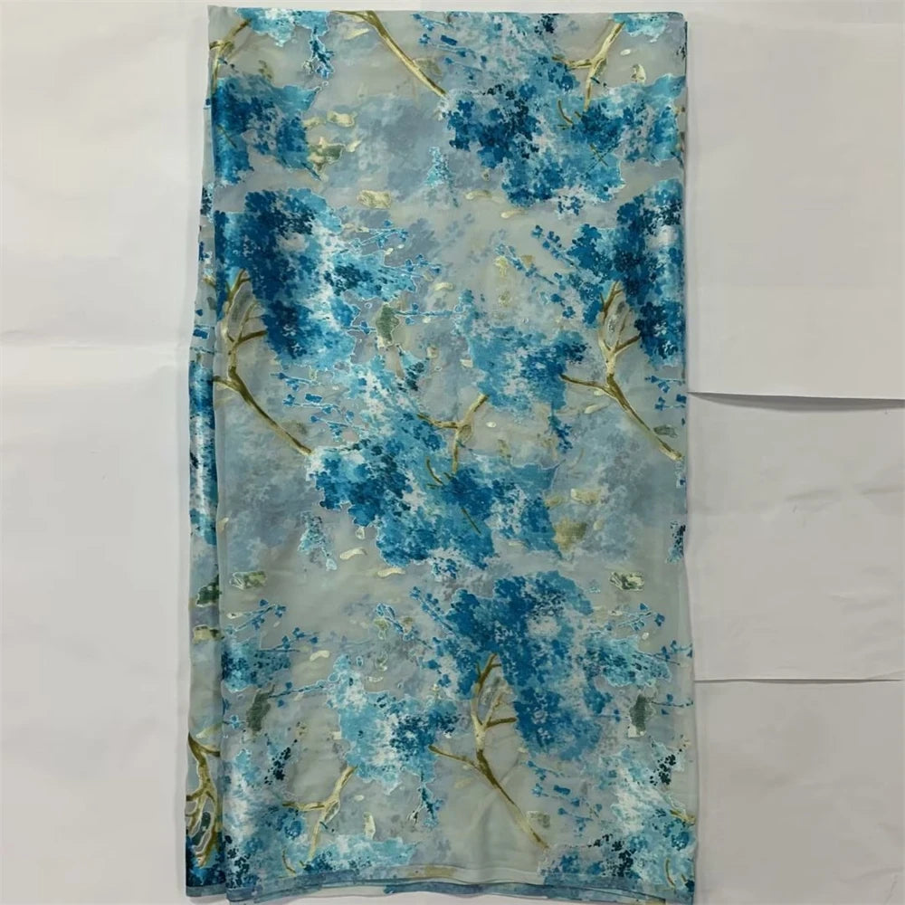 tissu tulle bleu clair fleurs texture liquide opacité élégant gala respirant rapide biologique respectueux