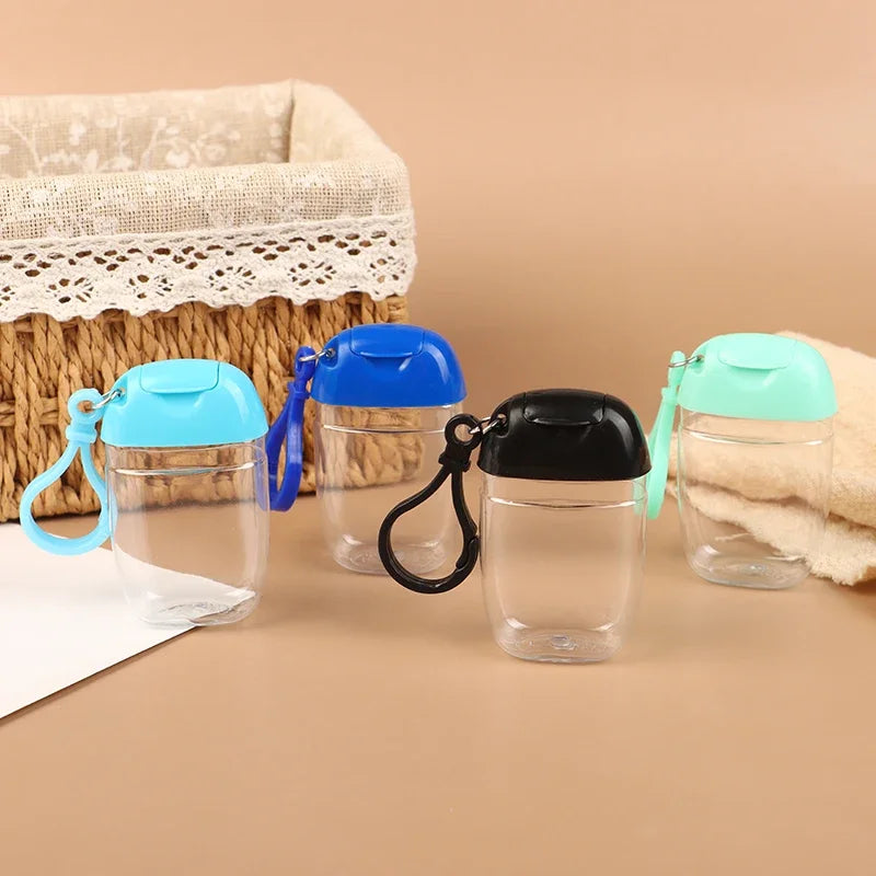 flacons rechargeables transparents modernes couleurs rouge rose bleu vert blanc jaune anneaux fixation couvercles
