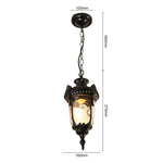 lampe suspendue vintage bronze noir ornements sculptés verre texturé semi opaque chambre salon