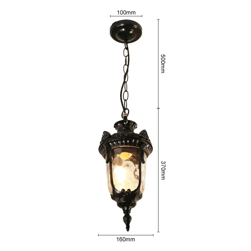 lampe suspendue vintage bronze noir ornements sculptés verre texturé semi opaque chambre salon