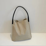 sac main femme toile douce minimaliste décontracté polyvalent beige clair quatre saisons fixations inclusion