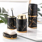 ensemble vaisselle salle bain marbre doré moderne vert foncé blanc noir respectueux environnement