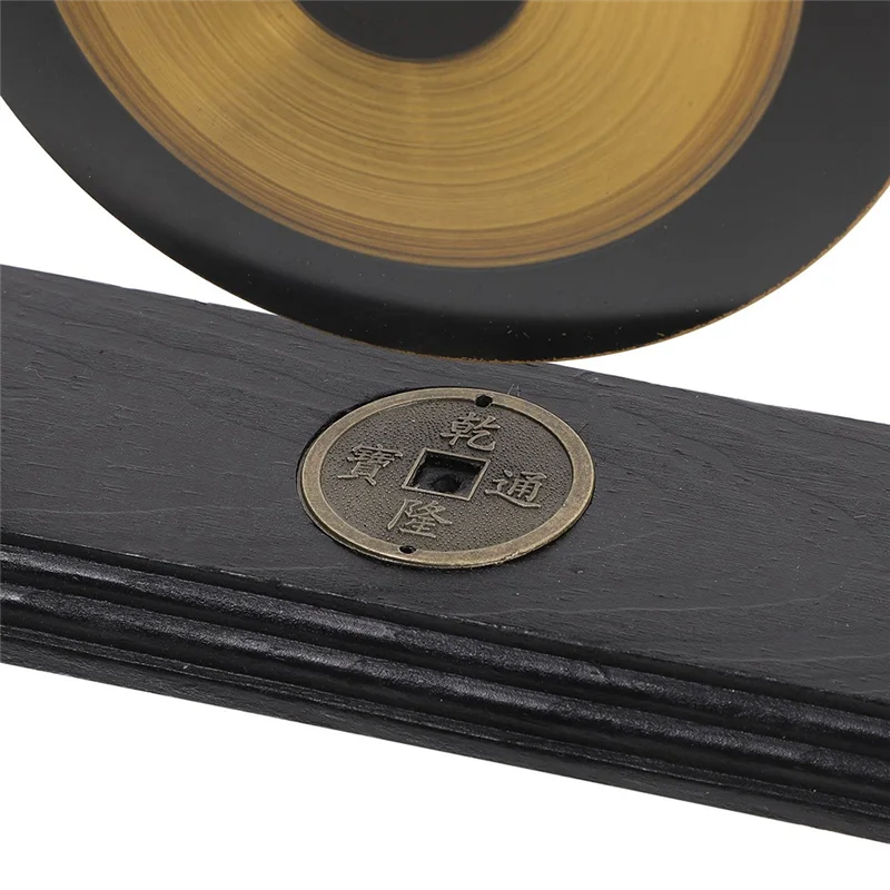 ornement feng shui gong noir doré rond brillant maison chic brass déco