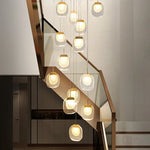 suspension lumineuse moderne transparent dorée fine élégante chaînes métalliques ampoules incluses