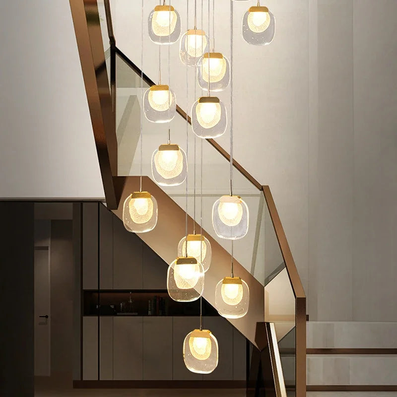 suspension lumineuse moderne transparent dorée fine élégante chaînes métalliques ampoules incluses