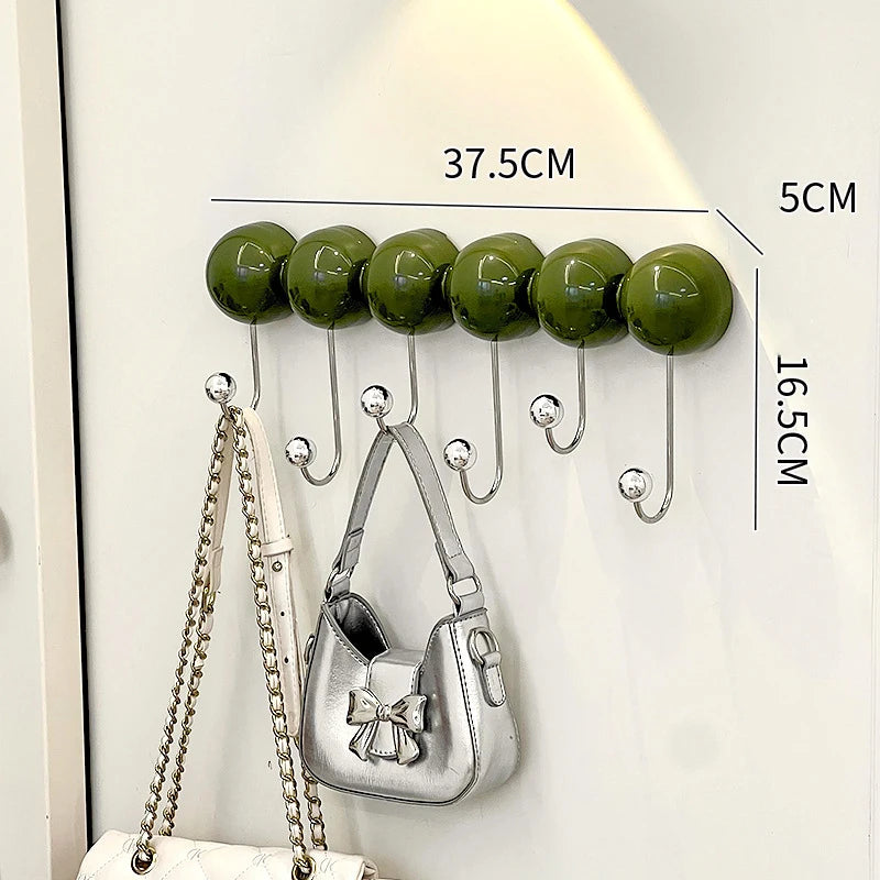 porte sacs mural moderne adhésif sans perçage crochets rouge vert olive sphères brillantes