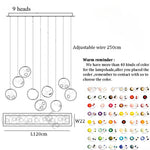 lampes suspendues modernes sphères colorées brillantes intensité variable transparentes opaques chambre salon