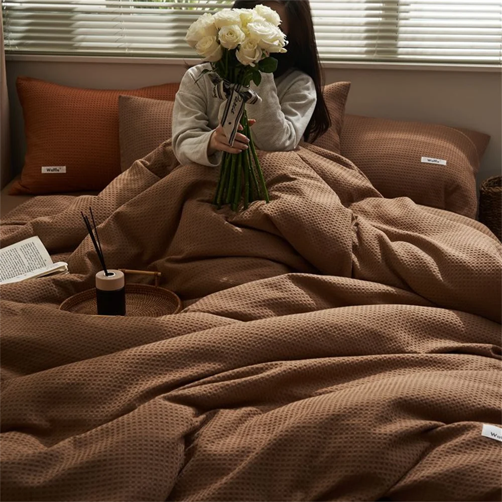 Housse de couette étalée montrant le tissu non tissé
