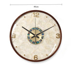 horloge murale moderne élégante face unique bois chiffres dorés aiguilles secondes quartz batterie