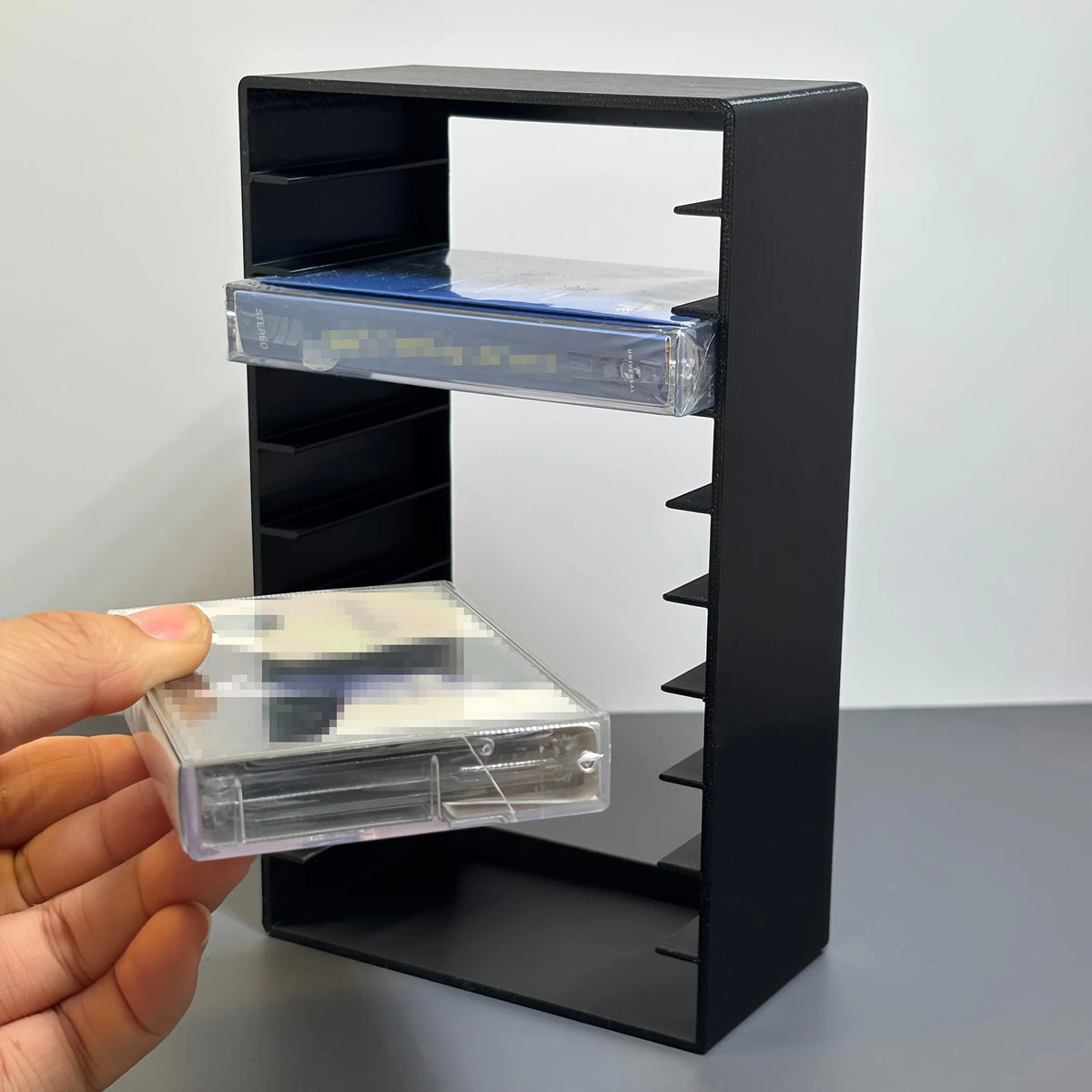 rangement cassettes audio noir protections transparentes moderne minimaliste rechargeable multifonction almacenamiento