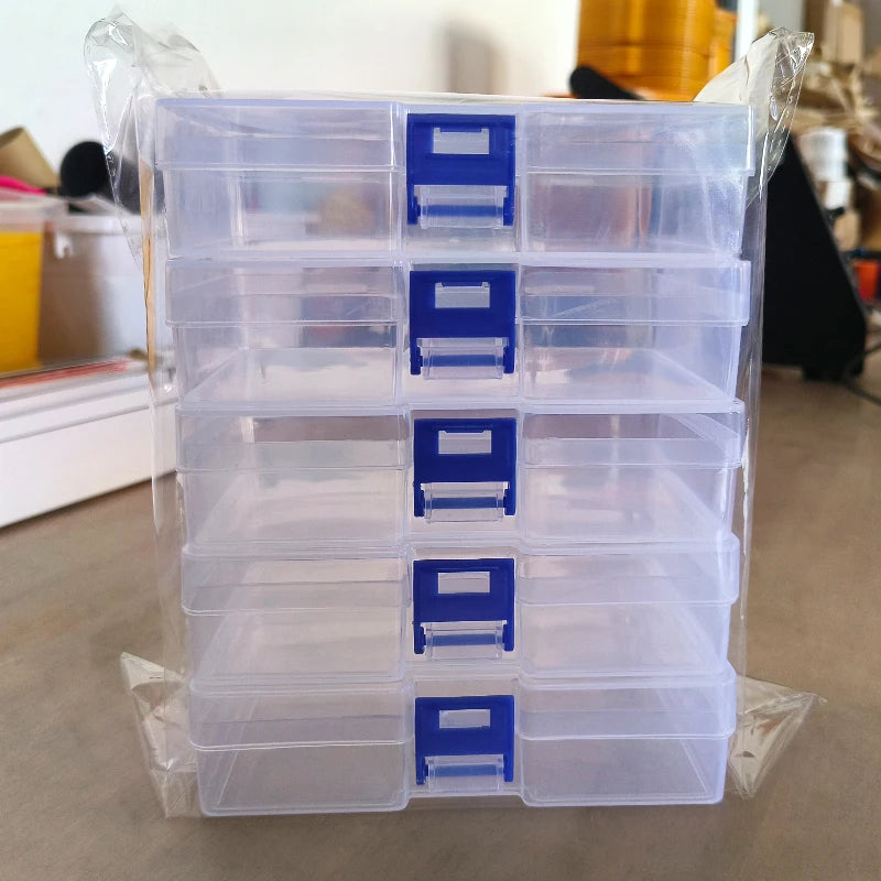 boîtes rangement transparentes bleu clair empilables pinceaux poignées modernes utilisation multiple petits objets