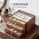 coffret bijoux bois marron tiroirs poignées dorées rangement moderne minimaliste
