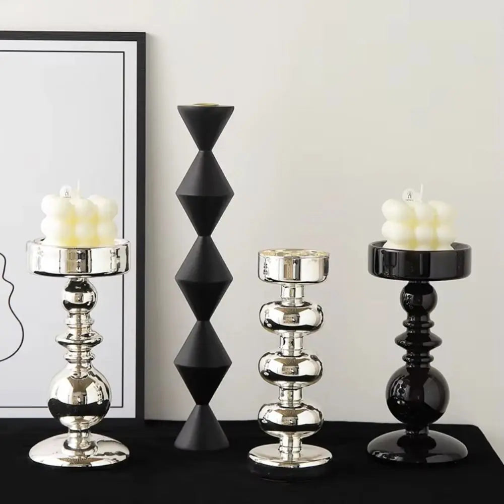 bougeoirs moderne élégants noir argenté sphériques table decoration lumière romantique festive minimaliste