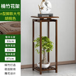 meuble plante moderne gravure traditionnelle marron foncé vases sculpturales or doré