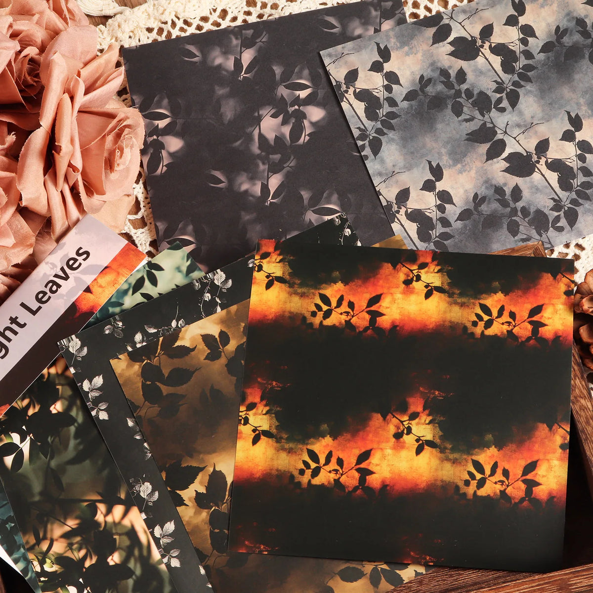papier decoratif feuilles noires fond sombre feuilles blanches fond clair artisanal noir orange gris