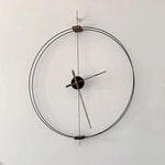 horloge murale moderne minimaliste aiguille bois métal noir marron argenté doré salon