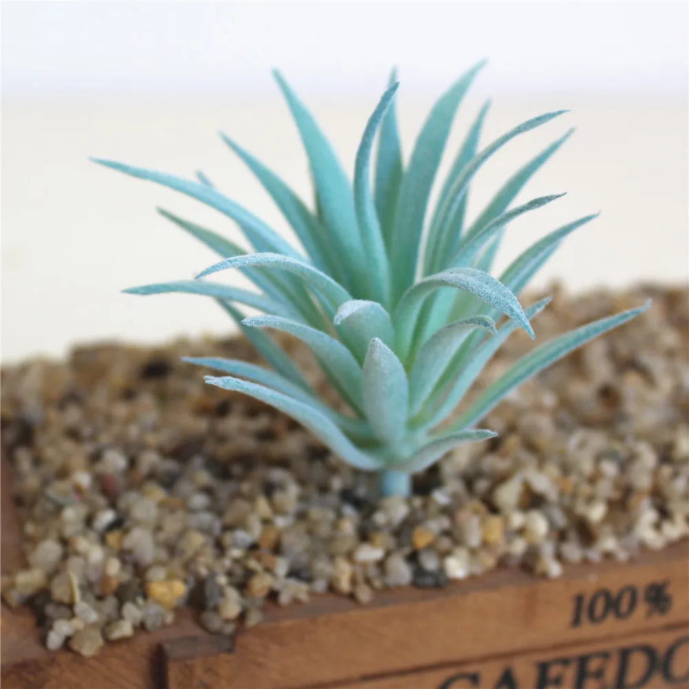plantes artificielles bleu violet rose vert feuilles pointues moderne décoration intérieure extérieur gravier bois