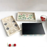 assiettes plates mosaïque multicolore artisanal rangement blanc vert bleu noir rouge triangles