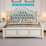 lit double blanc tête capitonnée coffre intégré élégant classique chambre coucher matériaux bois motifs