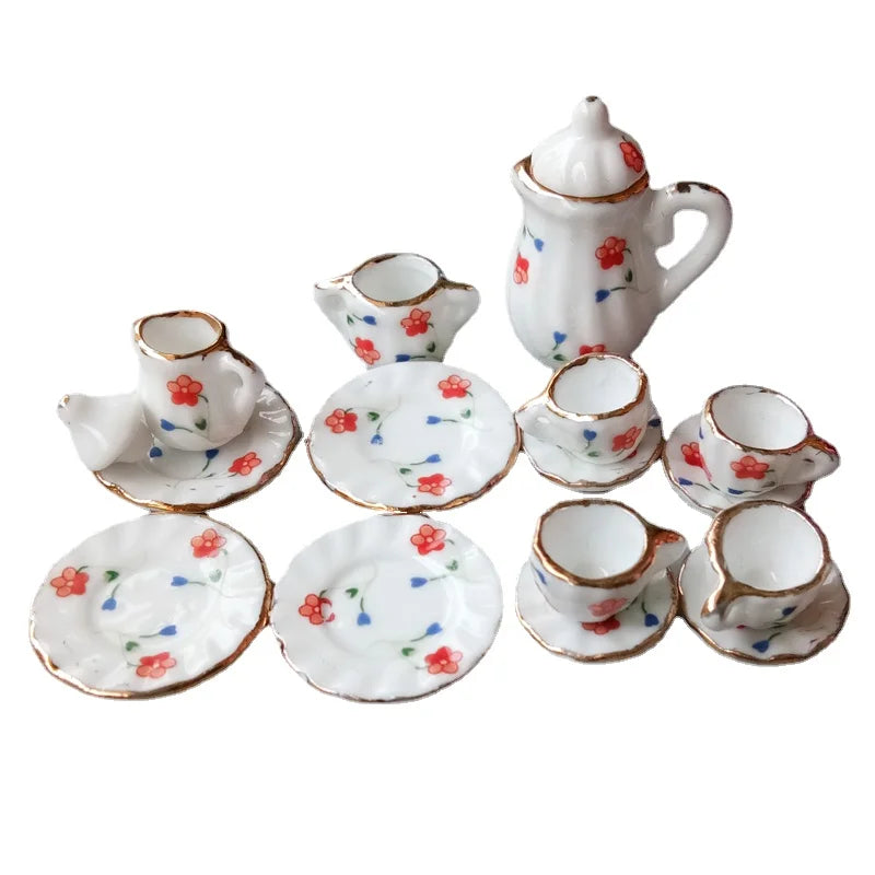 service thé miniature blanc doré rose bleu vert fleurs classique tasse théière soucoupe assiette