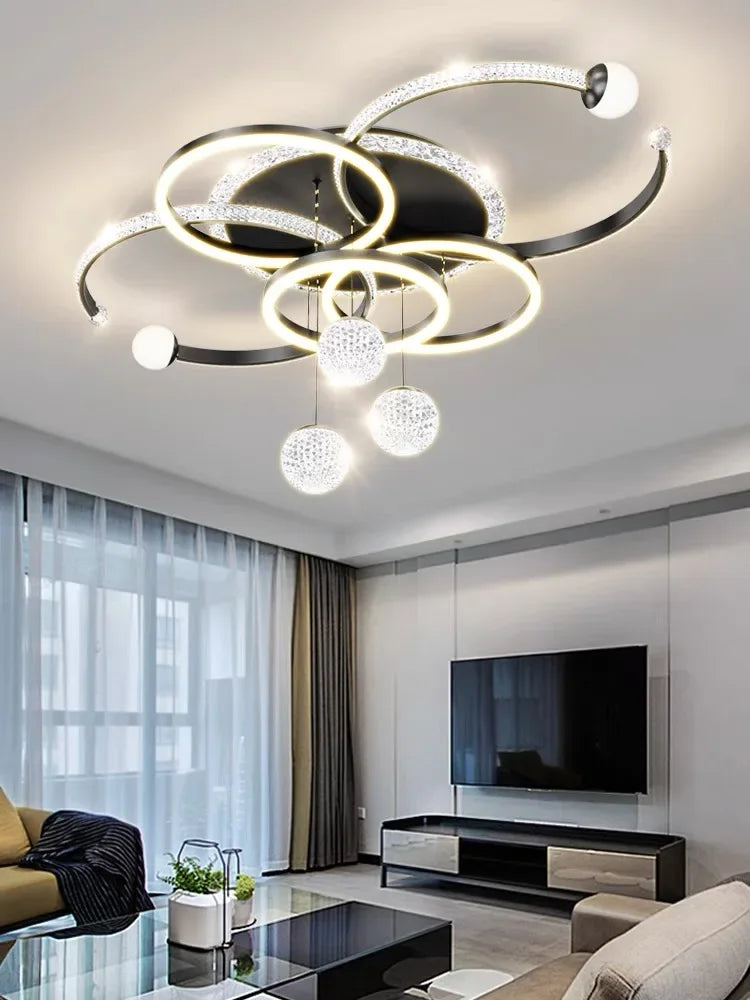 lustre moderne suspension contemporain argenté doré blanc noir globes translucides anneaux lumineux strass decoration
