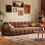 canapé moderne velours beige marron olive salon contemporain coussins différentes tailles