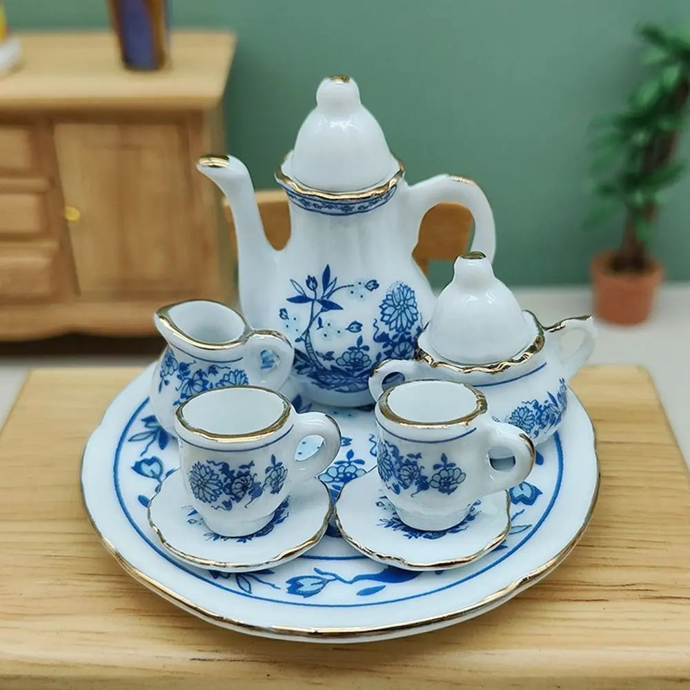 service thé miniature blanc bleu fleurs classique théière crème sucrier tasses assiettes