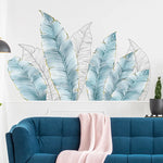 sticker mural feuilles palmier bleu clair blanc doré moderne décoration intérieure adhésif auto collant