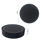 Ensemble de sous-verres ronds en cuir noir avec coutures apparentes pour une finition élégante.