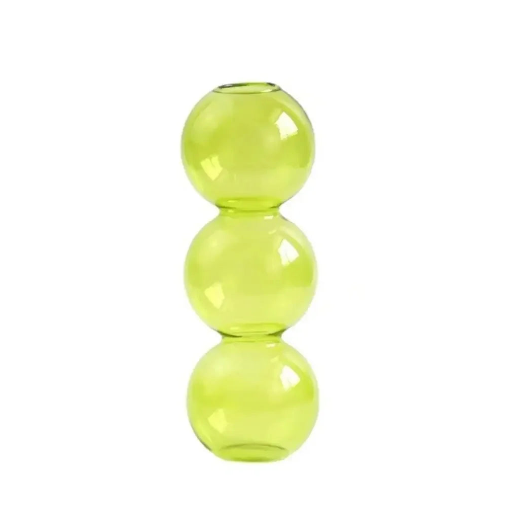 vase moderne transparent sphères empilées jaune clair rose bleu vert brun