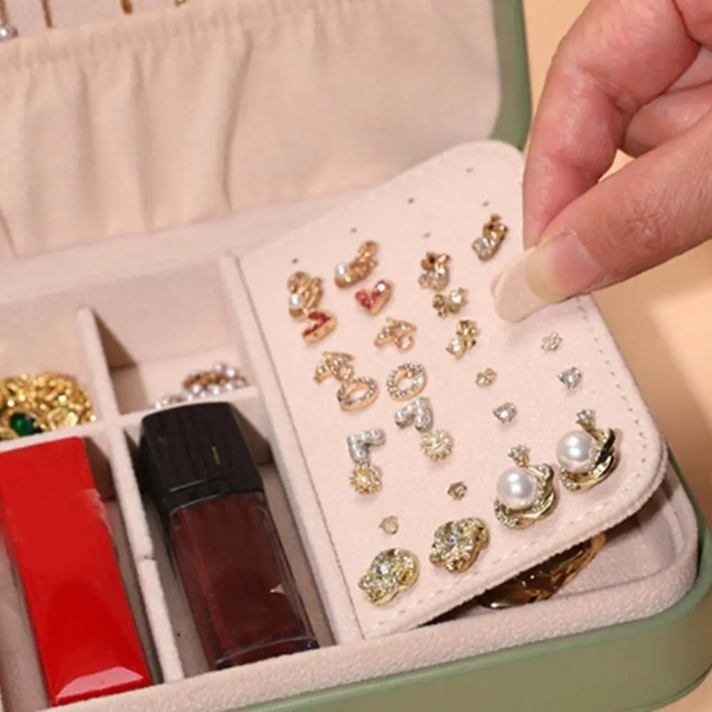 boîte bijoux cuir vert moderne élégante compartiments boucles d'oreille étiquettes incluses