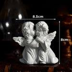 statuette ange résine blanche texture fine classique détails sculptés ornement