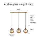 suspension lumineuse transparente moderne ampoule brillante câble noir minimaliste chambre salon étude