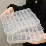 boîtes rangement bijoux transparentes plastique clips magnétiques poignées modernes pratique
