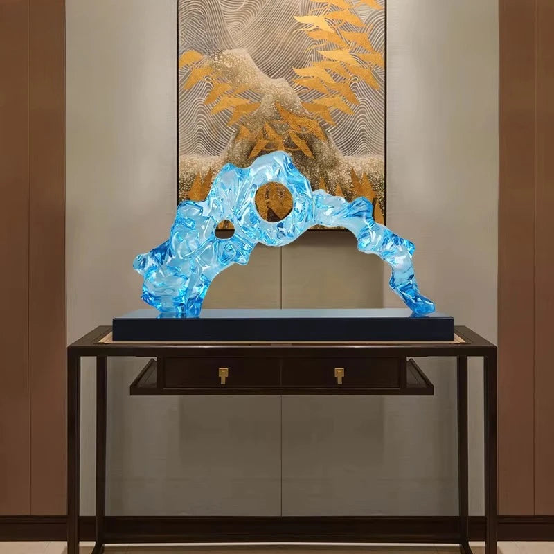 sculpture abstraite moderne bleu clair texture ondulée translucent base noire