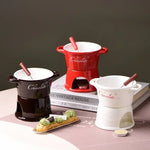 bouilloire chocolat céramique moderne cuillère bois bougie rouge noir blanc