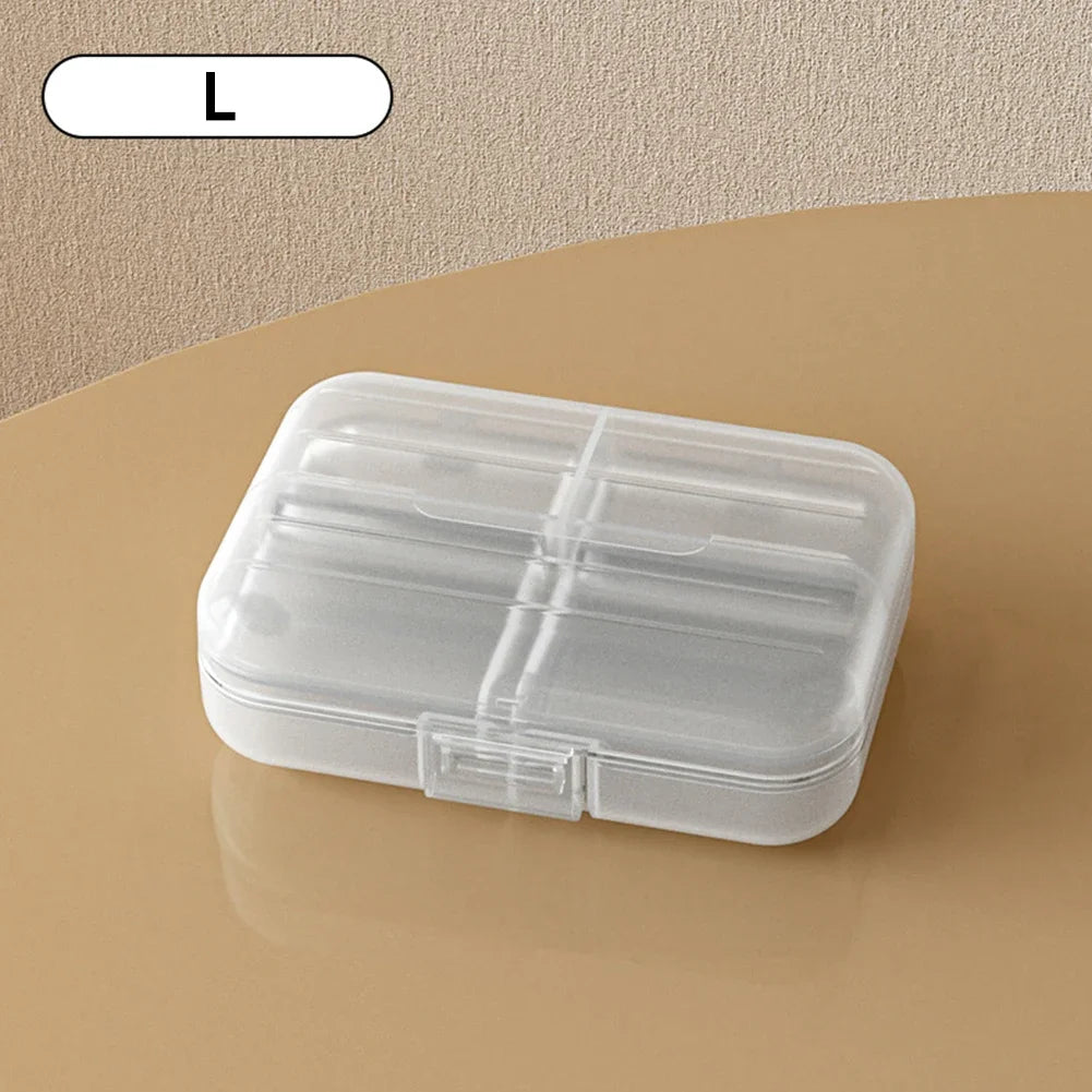 boîte pilules moderne blanc rose compartiments semaines verrouillable pratique adhésif organisateur médicaments portable