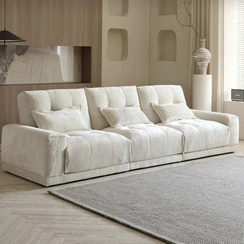 canapé convertible moderne beige clair tissu doux oreillers livraison gratuite minimaliste