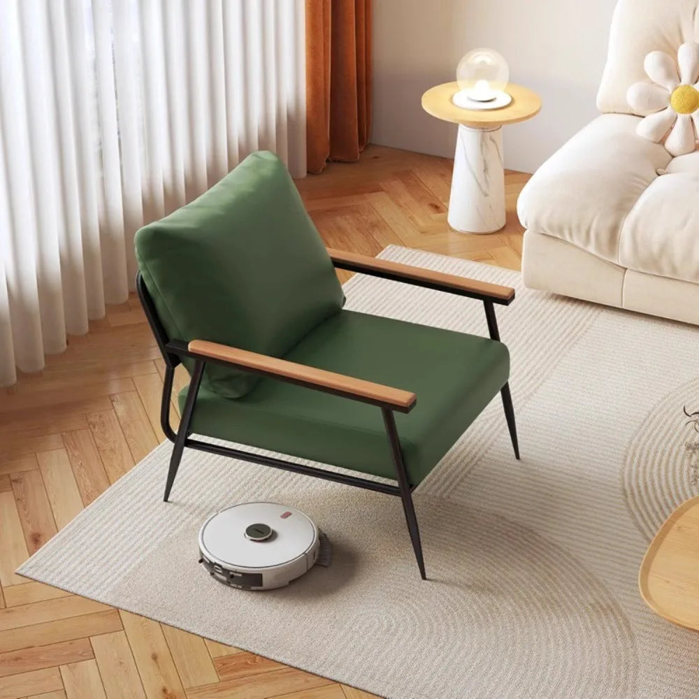fauteuil moderne minimaliste vert noir bois clair coussin motif géométrique salon chambre decoration meubles