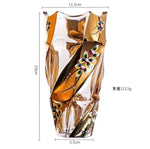 Vase décoratif moderne transparent torsadé motifs floraux dorés élégants handcrafted